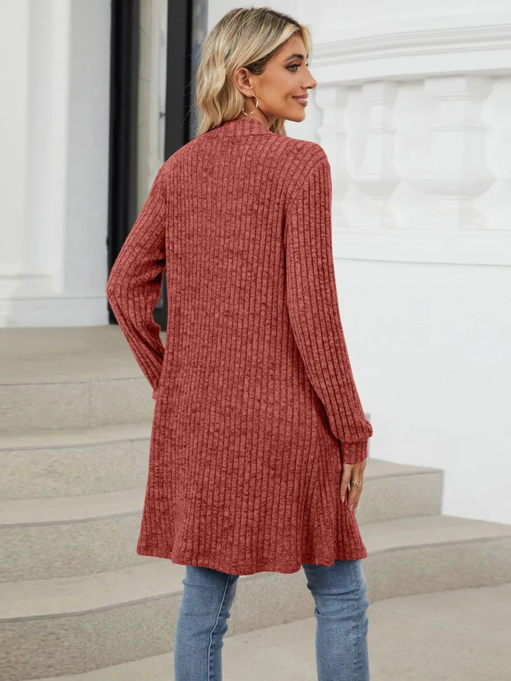 Autumn and winter long color long sleeved loose pocket cardigan jacket for women