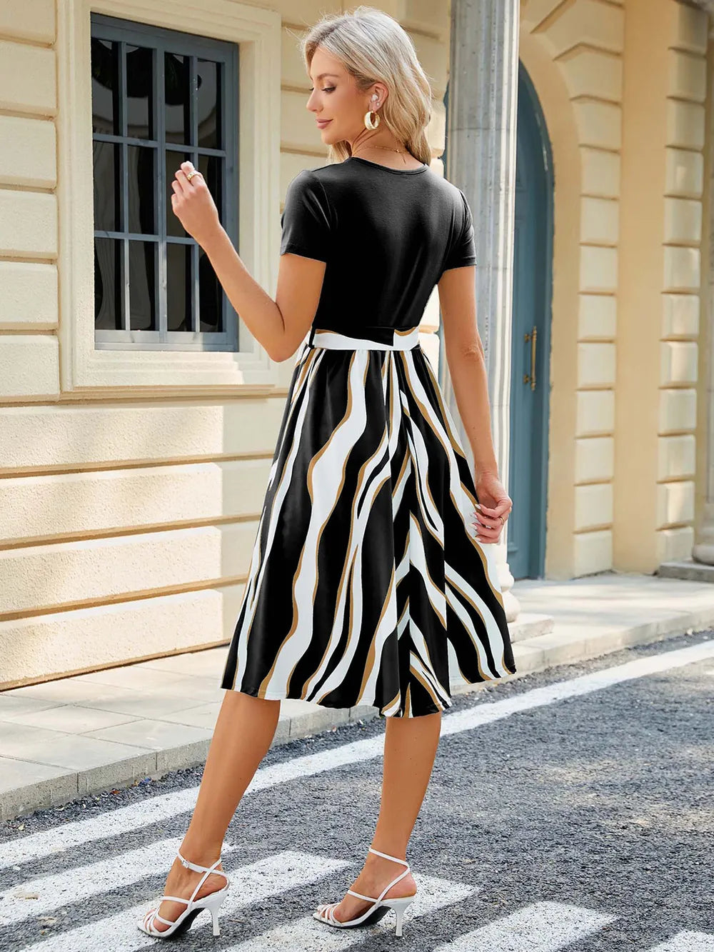 Spring and summer new round neck patchwork printed short sleeved dress with large swing